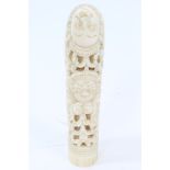 19th century Indonesian carved ivory knife handle intricately carved with demons,