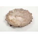 George III silver waiter of circular form, with piecrust border and shell and scroll edge,