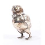 Continental white metal pepperette modelled in the form of a chick, with slip-on head,
