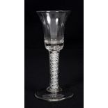 Mid-18th century Georgian wine glass with trumpet-shaped bowl with air-bubbles at base,