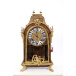 Louis XIV and later mantel clock with month duration spring-driven movement and outside numbered