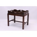 19th century mahogany butlers tray of rectangular form, with pierced undulating gallery,