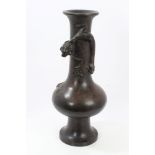 Antique Chinese bronze vase with coiling dragon mount, dark brown patination overall,