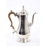 George III silver coffee pot of baluster form, with engraved full armorial shield,