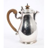 Edwardian silver hot water jug of baluster form,