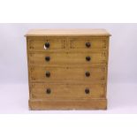 Victorian grained pine chest of drawers with two short over three long graduated drawers,