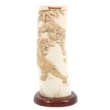 Late 19th century Japanese carved ivory tusk vase finely decorated in relief with lion and two