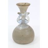 Roman glass vase with flared neck, two scroll handles and bulbous body,