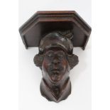 19th century or earlier carved oak figural wall bracket carved in the form of a gentleman with