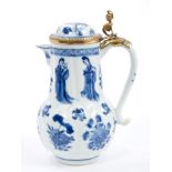 Late 17th century Chinese Kangxi blue and white jug and cover with gilt metal hinged mount and