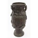 Japanese Meiji period bronze vase of slightly swollen baluster form,