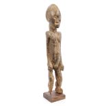 Antique African tribal carved wood fertility figure, probably Nigerian, 39cm high,