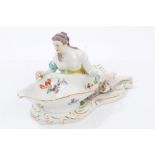 19th century Vienna porcelain table ornament of a reclining female figure with open dish,