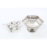 A Walker and Hall silver hexagonal-shaped pierced dish raised on a foot (Sheffield 1922),