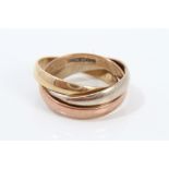 Three-colour 9ct gold 'Russian' wedding ring with three interlocking bands CONDITION