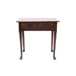Mid-18th century walnut lowboy, the rectangular moulded top with re-entrant angles,