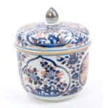 Early 18th century Chinese Imari pot and cover with floral decoration, 15cm high.