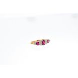 Edwardian ruby and diamond ring with three oval mixed cut rubies and six old cut diamonds in