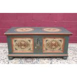 19th century Scandinavian polychrome painted pine dowry chest painted with floral reserves,