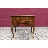 Good early 18th century walnut crossbanded and feather-banded lowboy,