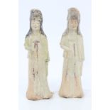Pair Chinese pottery female tomb figures, possibly Tang or Ming, with traces of glazed decoration,