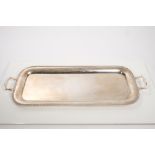 1920s narrow silver two-handled tray with gadrooned border (Birmingham 1925), maker's mark rubbed.
