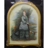 Fine quality late 19th century overpainted photograph of a young woman in a parkland setting,