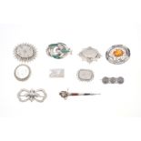 Group of ten silver and white metal brooches - to include three hardstone brooches and Victorian