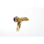 Regency-style gold ring in the form of a hand with jewelled cuff, on reeded shank (London 1971).