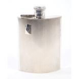 Late 1940s silver spirit flask of shaped form, with engine-turned decoration,