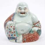 Early 20th century Chinese porcelain figure of seated Buddha,