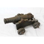 Decorative signalling-type cannon with cast iron banded barrel,