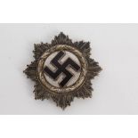 Second World War Nazi 'The German Cross' in gold with gilt laurel wreath border (gilding worn),