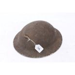 British Military MK2 steel helmet with bullet embedded in it