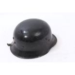 German Fire Brigade helmet, circa 1940, in black painted finish,