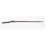 Early 19th century Indian matchlock musket with damask barrel, engraved mounts,