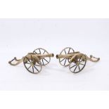 Decorative pair brass model cannons on brass carriages,