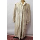 Ladies' good quality 'Saga Mink' long-length silver mink coat, hidden pocket and furrier fastening,