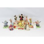 Eleven Royal Doulton Bunnykins The Occasions Collection figures and an Occasions stand (12) plus