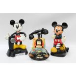 Collection of nine Disney telephones