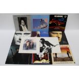 Approximately seventy-five LP records - including The Police, Pretenders, Queen, Rod Stewart,