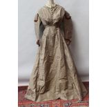 Ladies' silk Victorian dress with full skirt gathered at back of narrow waist, high neck,