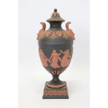 Wedgwood black Jasper ware two-handled urn-shape vase and cover decorated with terracotta classical