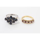 Gold (18ct) ruby and diamond half eternity ring, size K½, together with a sapphire cluster ring,