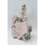 Large Lladro porcelain figure - seated lady with fan