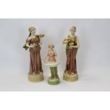 Three Royal Dux porcelain figures - lady with bowl of fruit, 38cm high, lady with jug and chalice,