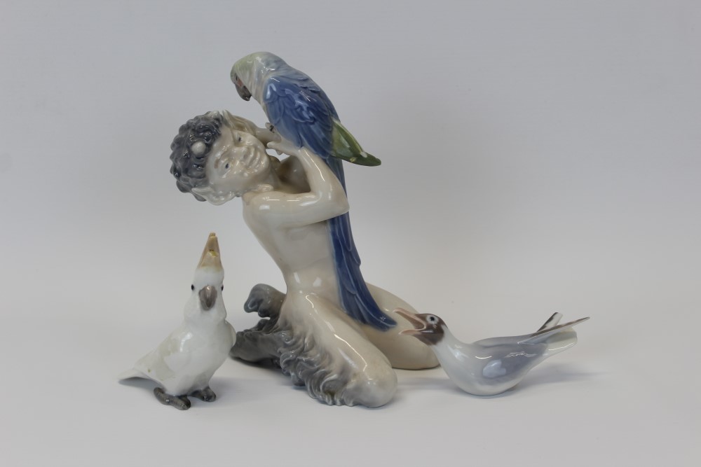 Royal Copenhagen porcelain figure of a fawn with parrot, by Christian Thomsen, numbered 752,