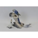 Royal Copenhagen porcelain figure of a fawn with parrot, by Christian Thomsen, numbered 752,