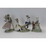 Three Lladro porcelain figures - Boy and girl on see-saw,