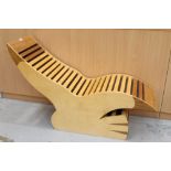 Unusual wooden chaise longue in the form of a seagull